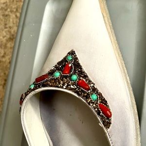This is a white vintage Italian jeweled mule
